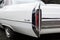 Closeup of a wing and rear light of a luxury retro Cadillac Coup