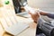 closeup of a wireless router and a man using smartphone on living room at home ofiice