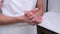 closeup woman applying protective cream on hands