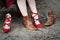 Closeup of woman changing her high heels for boots