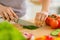 Closeup on woman cutting fresh dill