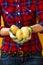 Closeup on woman grower showing potatoes