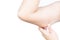 Closeup woman hand checking upper arm on white background health