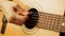 Closeup of a woman hand playing classical guitar