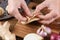 Closeup of woman hands making Nepalese traditional dumplings mom