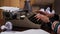 Closeup of Woman Hands Typing on a Typewriter