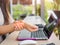 Closeup woman holding her wrist pain from using computer.