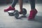 Closeup on woman lifting dumbbell from the floor