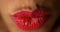 Closeup of woman pressing lips together