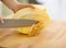 Closeup on woman removing seeds from melon slice