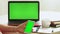 Closeup woman sitting table notebook female hands keyboarding laptop using texting pointing networking green screen