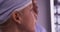 Closeup of woman surgeon looking at xrays