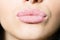 Closeup on woman sweet candy sugar lips kiss