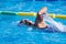 Closeup of a woman swimming in the pool. Fitness competition in Costa Rica.