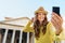 Closeup of woman taking selfie at Pantheon cheering