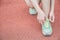 Closeup of woman tying shoe laces. Female sport fitness runner getting ready for jogging outdoors on the lanes of a track