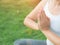 Closeup woman yoga with lotus hands in soft focus background