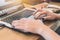 Closeup women hand using laptop touchpad while working