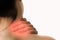 Closeup women neck and shoulder pain/injury with red highlights on pain area with white background, healthcare and medical concept