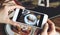 Closeup of women`s hands taking photo of sweet dessert by smartphone