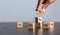 Closeup wood cubes with percentage symbol, Interest rate and dividend concept, wooden block with percentage symbol and up arrow,