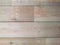 Closeup wood pine floor wooden natural flooring plank unfinished weathered aged interior design decor