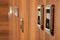 Closeup of wooden closet in fitness club with digital access