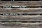 Closeup of wooden plank siding on old rustic shed