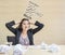 Closeup working woman are stressed from work on wooden desk and wall textured background in room , asian woman stressful job conce