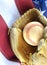 Closeup of worn baseball and mitt on a US flag background, great for America`s favorite pasttime. Vertical image.