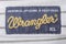 Closeup of Wrangler label on a shirt.