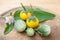 Closeup yellow eggplants on chopping block Solanum aculeatissimum Jacq