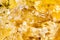 Closeup of yellow honey calcite mineral stone, pattern background