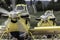 Closeup of yellow hydroplanes for firefighters in a field under the sunlight