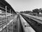 Closeup of Yesvantpur Junction railway station inside view of station corridor, escalator, pedestrian path, trains in a platform