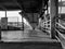 Closeup of Yesvantpur Junction railway station inside view of station corridor, escalator, pedestrian path, trains in a platform