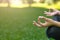 Closeup of yoga woman hand in lotus pose