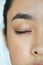 Closeup of Young Asian girl portrait eyes closed