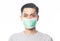 Closeup Young Asian Man wearing hygienic mask to prevent infection, 2019-nCoV or coronavirus. Airborne respiratory illness