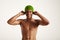 Closeup of a young black swimmer in green cap