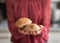 Closeup on young housewife holding mushrooms