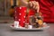 Closeup on young woman with christmas snacks