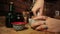 Closeup: Young woman`s hands grind spices using a Mortar and Pestle