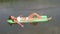 Closeup Young Woman In White Swimsuit Sunbathing Laying On Mattress In The Water