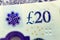 A closeup of Â£20 Twenty pounds cash money bill Sterling polymer banknote from the bank of England