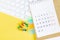 Closing month calendar for 2021 on yellow background, planning a business meeting or travel planning concept