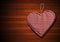 Cloth Heart on Brown Wood Background