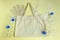 On the cloth reusable bag lie cellophane disposable bags, gloves