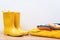 Clothes and boots. Seasonal shopping and sales. Yellow rain boots and outumn outfit