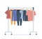 Clothes hanger with different casual man and woman clothes. Casual seasonal clothes. Boutique, assortment showroom, personal